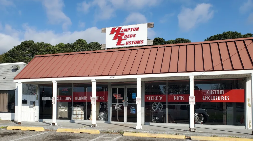 The Hampton Roads Customs storefront on West Mercury Boulevard in Hampton, Virginia, with window signage for stereos, alarms, tinting and custom enclosures.